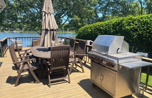 Mattituck House | Luxury waterfront beach house with dock, kayaks canoe, paddle-board and hot tub