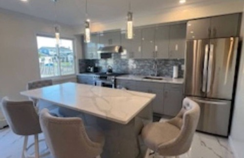 Copiague Apartment | Luxury Waterfront Getaway: Pool, Fishing & Basketball! Stunning water views