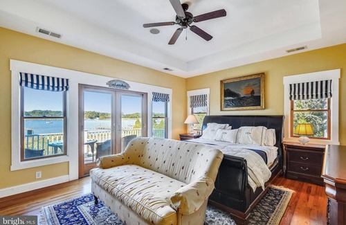 Arundel on the Bay Condo | Luxury Waterfront home with private pier and guest house