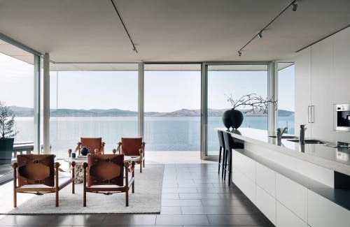 Sandy Bay House | Luxury waterfront home with pool and beach access