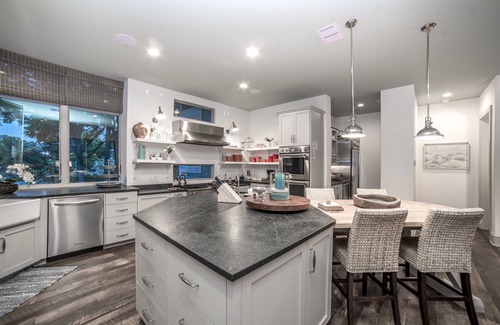 McQueeney House | Luxury Waterfront Lakehouse with Volleyball, Boat Dock, Fire Pit, 8 bedrooms