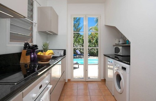 Orient Bay Villa | Macassi 4, Charming beachfront villa.