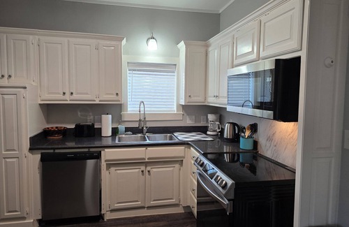 Denison House | Magnolia Manor Duplex in Downtown Denison-Bursting with Charm & Comfort