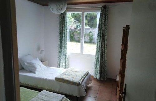 La Remigeasse House | Maison oléronaise avec la plage à pied et la piste cyclable au bout du jardin