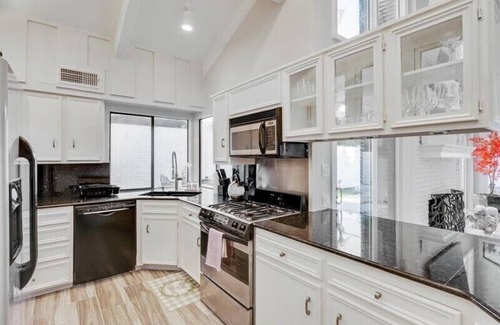 Irving House | Majestic 4BR/2.5B Home with Mini Golf, Pool, & Billiards