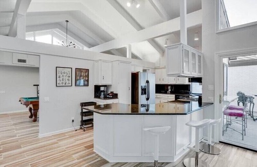Irving House | Majestic 4BR/2.5B Home with Mini Golf, Pool, & Billiards