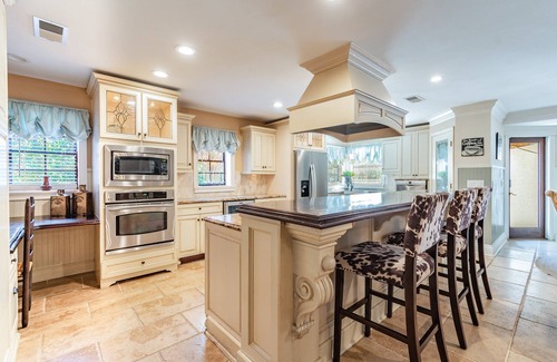 Lutz House | Majestic Brant Manor: Stately 8 Bdrm, Lakefront Manor w/Pool, 15Min to City