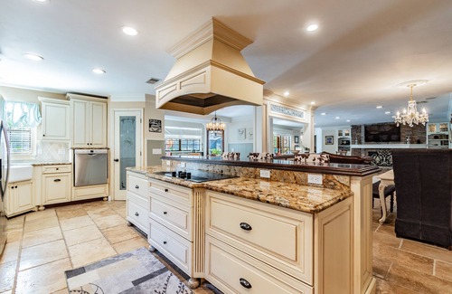 Lutz House | Majestic Brant Manor: Stately 8 Bdrm, Lakefront Manor w/Pool, 15Min to City