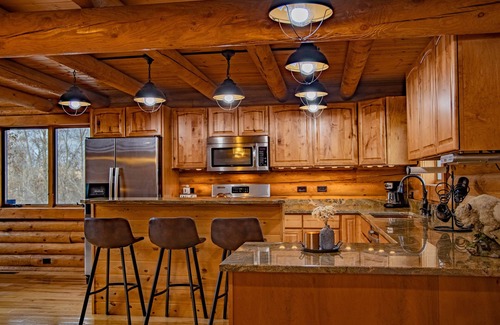 Meeteetse Cabin | Majestic Wyoming Landscape. Riverfront log cabin. Relax in or explore out!