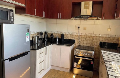 Kampala House | Malachite Apartment 8