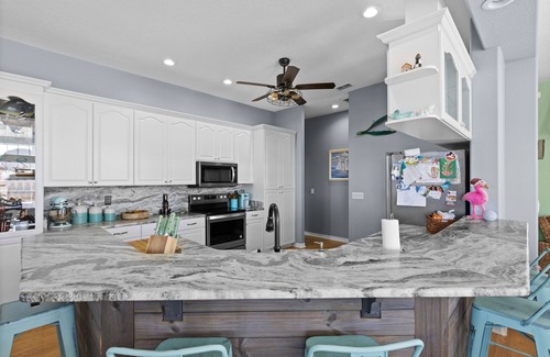 Spring Hill House | Manatee time! Waterfront Home, floating dock, kayaks, paddle boards, gulf access