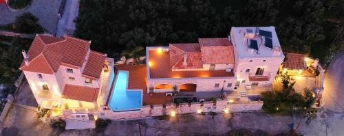 Riglia House | Mani Stone Towers