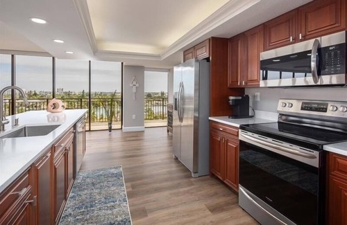Sunset Beach House | Mansions by the Sea Treasure Island's Premier Gulf-Front Complex