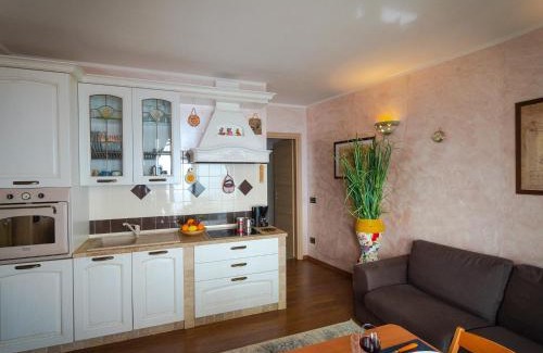 Plassi Apartment | Mantegna - garden with Lake view and swimming pool