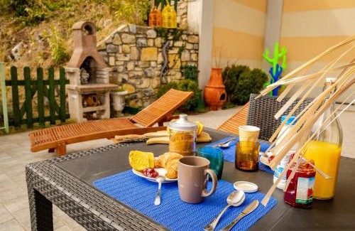 Plassi Apartment | Mantegna - garden with Lake view and swimming pool