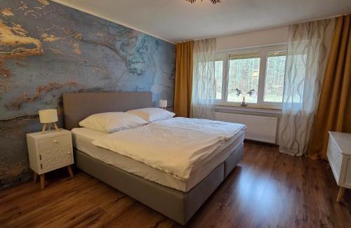 Marburg Apartment | Marburg Apartment feuriger Felix mit Kamin und Garten in ruhiger Waldrandlage