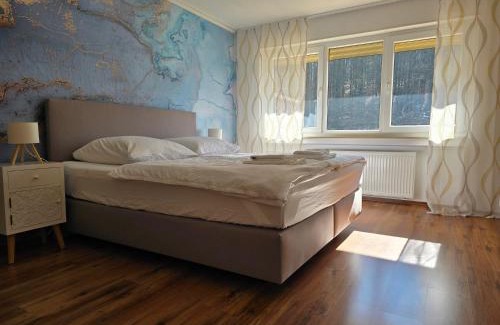 Marburg Apartment | Marburg Apartment feuriger Felix mit Kamin und Garten in ruhiger Waldrandlage