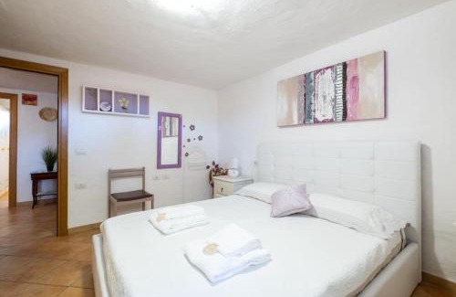 Limpiddu Apartment | [Mare a 4 minuti Auto]Casa/Giardino e WiFi Budoni