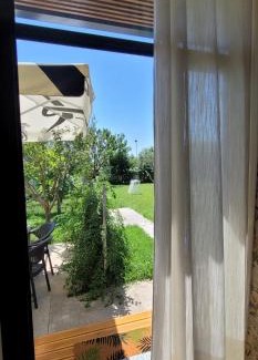 Sakës House | Margjelo's Twin Houses in the garden