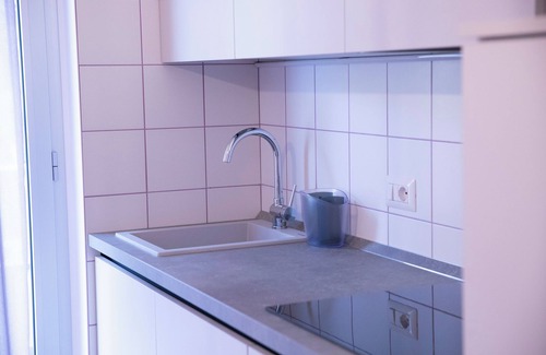 Roseto degli Abruzzi Condo | MARIGOLD RESIDENCE: AMETHYST ORCHID