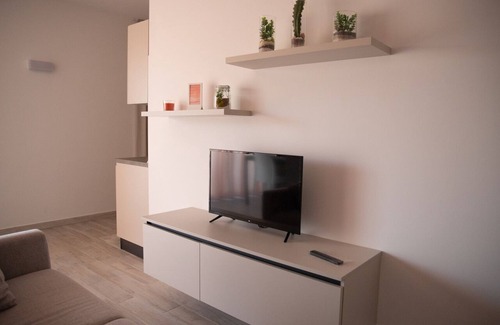 Roseto degli Abruzzi Condo | MARIGOLD RESIDENCE: BURNT CORAL
