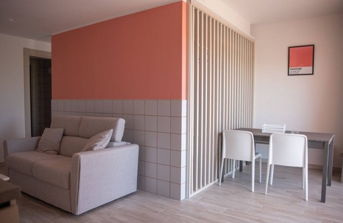 Roseto degli Abruzzi Condo | MARIGOLD RESIDENCE: BURNT CORAL
