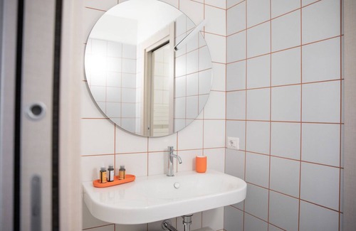 Roseto degli Abruzzi Condo | MARIGOLD RESIDENCE: BURNT CORAL