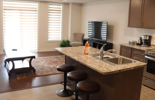 Markham House | Markham home near Toronto with dual patios, bright