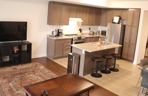 Markham House | Markham home near Toronto with dual patios, bright