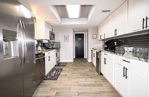 Hampton Homes House | Marlin on Merritt Pool House featuring Private Game Room, Mini Golf & Fire Pit!