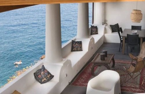 Piscita Villa | Marvel at sea & volcano views frm a chic Stromboli retreat steps from the beach.