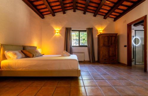 Hostalric Villa | MAS PUIG PIQUÉ - piscina privada, porche, BBQ, y WIFI - 15 PERSONAS