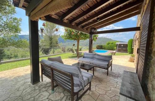 Sant Marti de Llemena Girona House | Masia with pool and beautiful views near Girona
