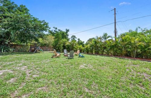 Merritt Island House | Merritt Island Escape Tropical Paradise 2 Story Fun Fire Pit