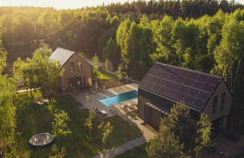 Ciekocino Villa | Między Brzozami / Domy w lesie