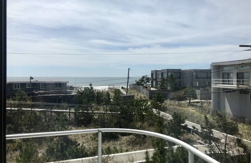 Fire Island Pines House | Mid-century modern escape steps from the ocean! Large Sunny Heated Pool, A/C