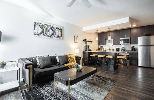 Overland Park Apartment | Mid-Rise Luxury 1 BR 1 BD Free Carport Parking WiFi and Dedicated Workspace