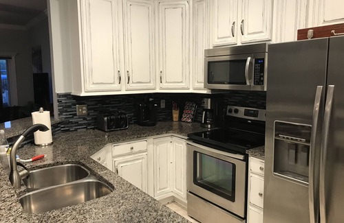 Sunrise Beach Condo | Minimal stairs! 15 second walk to pool, 45 second walk to 32x14 boat slip