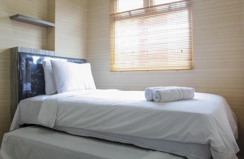 Rawasari Apartment | Minimalist 2BR Green Pramuka City Apartment near Shopping Mall By Travelio