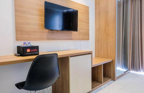 Bumi Serpong Damai Apartment | Minimalist Studio Apartment at Casa De Parco By Travelio