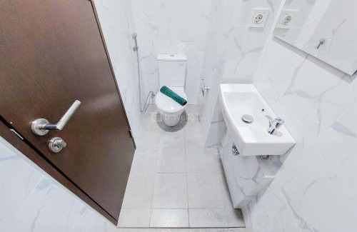 Pinang Apartment | Minimalist Studio Room near Campus at Pacific Garden Alam Sutera Apartment By Travelio