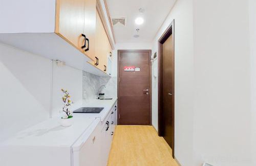 Pinang Apartment | Minimalist Studio Room near Campus at Pacific Garden Alam Sutera Apartment By Travelio