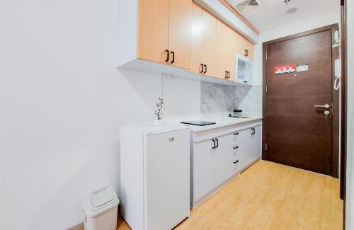 Pinang Apartment | Minimalist Studio Room near Campus at Pacific Garden Alam Sutera Apartment By Travelio