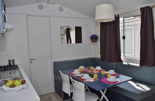 Arborea House | Mobilehome with air conditioning, pool and semi-covered wooden terrace