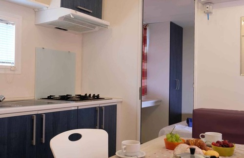 Arborea House | Mobilehome with air conditioning, pool and semi-covered wooden terrace
