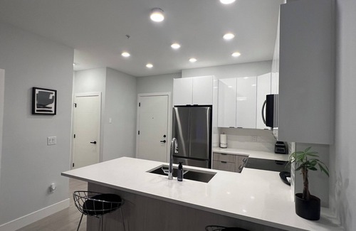 Langley Condo | modern 1 bdrm condo steps from casino
