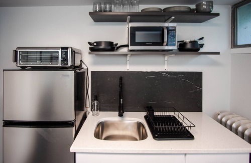 Riverview Apartment | Modern 1 bed basement unit for traveling professionals with garage and laundryn