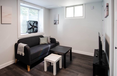 Riverview Apartment | Modern 1 bed basement unit for traveling professionals with garage and laundryn