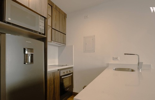 Chico Norte III Apartment | Modern 1BR in Luxury Building with Terrace in Chico
