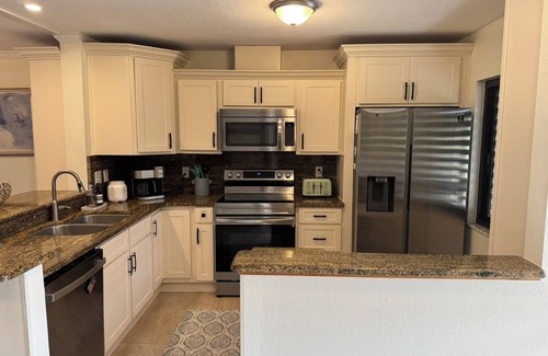 Tarpon Springs Condo | Modern 2 Bedroom Condo in Prime Gulf-Front Community with Pool, Wifi, AC & More